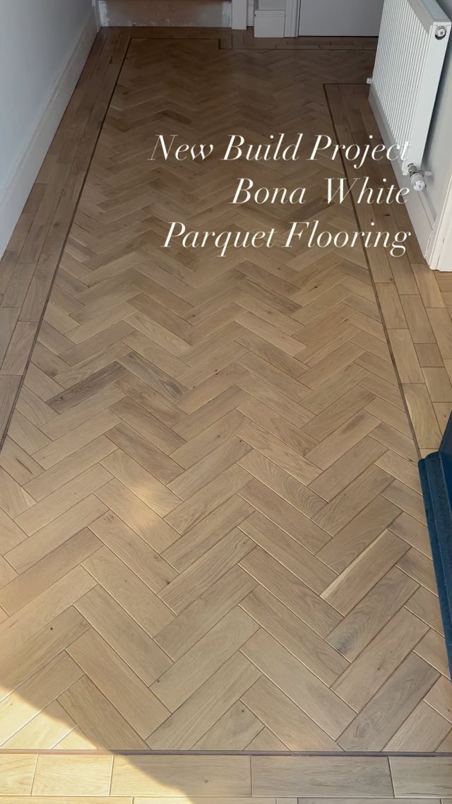 New property installed with solid parquet with a bona white lacquer finished with a walnut trim around border area #parquetflooringdublin #parquetfloors #solidparquetflooring #parquetflooringwexford #parquetflooringkilkenny #parquetflooringlaois #parquetflooring